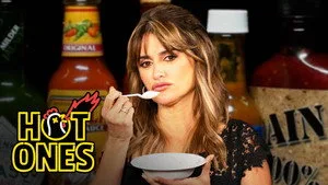 Penélope Cruz Laughs With Abandon While Eating Spicy Wings